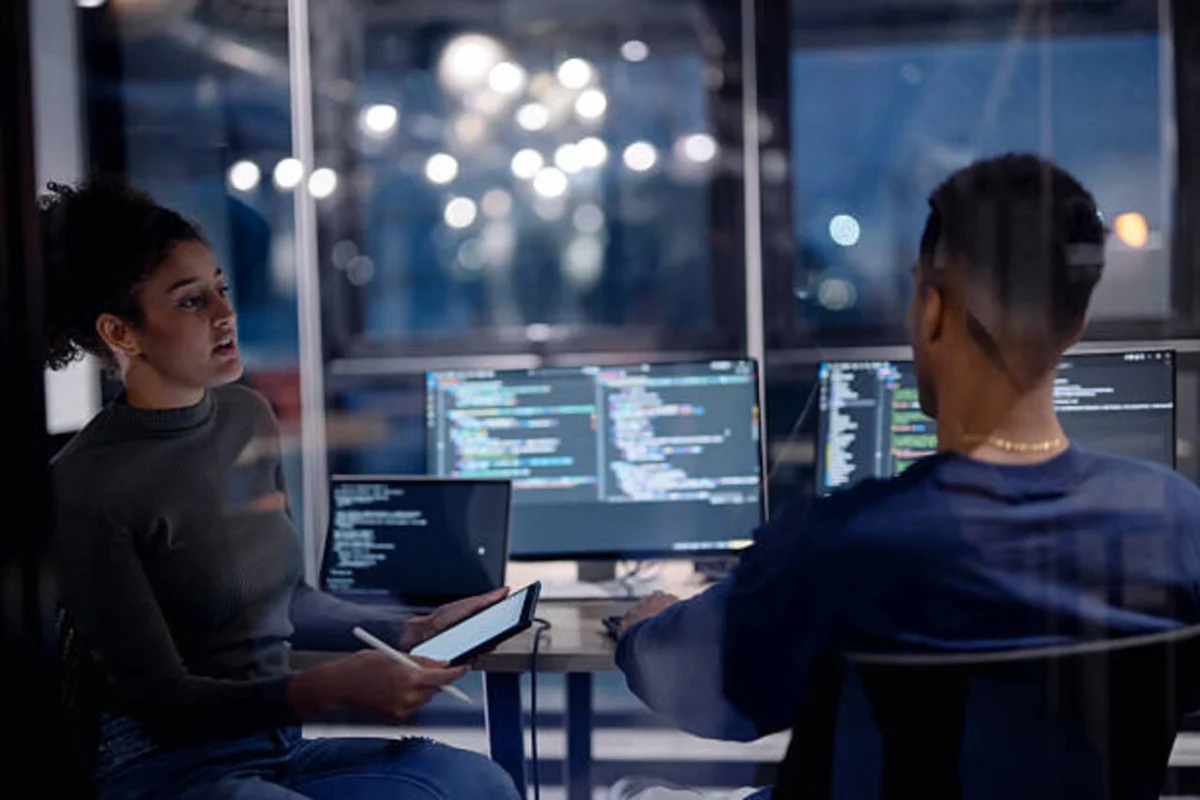 IT professionals working on enterprise network systems.